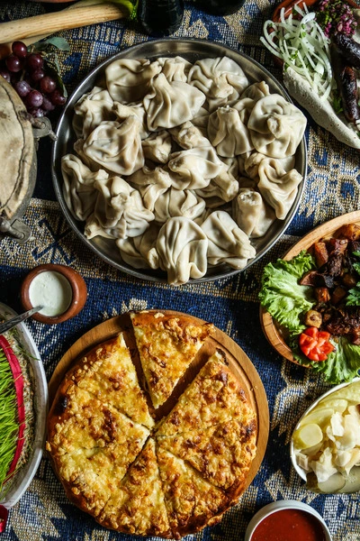 georgian-khinkali-damplings-minced-meat-greens-pla-2024-10-16-06-34-27-utc